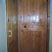 Металлическая дверь с обшивкой деревом